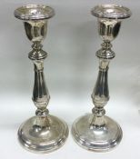 A large pair of silver candlesticks. Birmingham 19