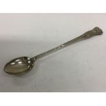 A large crested silver spoon with spiral handle. B