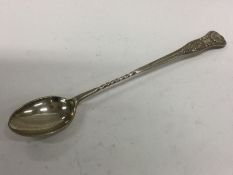 A large crested silver spoon with spiral handle. B