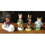 Three Bunnykins figures together with a Beswick fi