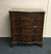 A Georgian style mahogany chest of four drawers wi