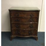 A Georgian style mahogany chest of four drawers wi