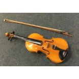 A modern cased violin. Est. £30 - £40.