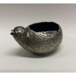 A rare early 20th Century silver sauceboat in the