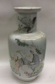 A large Chinese porcelain vase decorated with figu