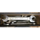 A box containing old spanners. Est. £10 - £20.