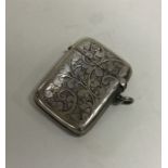 An engraved silver vesta case. Birmingham 1899. Ap