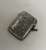 An engraved silver vesta case. Birmingham 1899. Ap