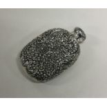 A heavy chased silver scent bottle of Chinese desi