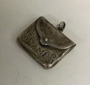 A silver stamp case with hinged lid. Birmingham. A
