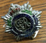 An Army Service Corps car badge. Est. £10 - 320.