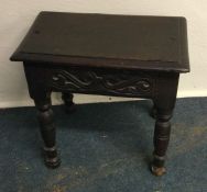 A small oak coffin stool. Est. £25 - £30.