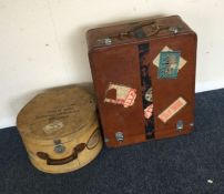 Two vintage suitcases. Est. £25 - £30.