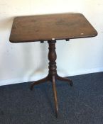 A Victorian mahogany occasional table. £30 - £50.