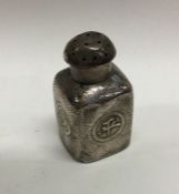A Chinese silver pepper with hammered and chased d