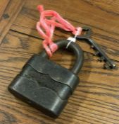 A large steel padlock and key. Est. £20 - £30.
