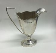 A silver helmet shaped cream jug. Sheffield. By Ma