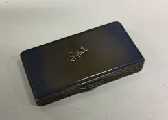 A silver and enamel hinged top box with gold inlay