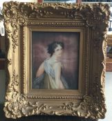 A gilt framed watercolour of a lady. Possibly 18th/19th century in the style of Henry Eldridge. Appr
