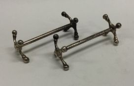 A pair of William IV silver knife rests. Birmingha