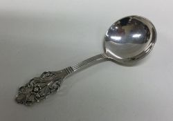 A decorative Norwegian silver caddy spoon. Approx.