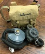 A chemical warfare gas mask together with paperwor