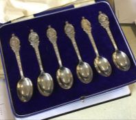 A cased set of six Mappin and Webb silver spoons.