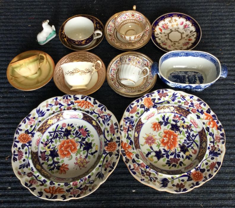 A good collection of cabinet cups and saucers etc.