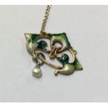 A Continental silver and enamelled pendant. Approx