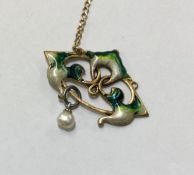 A Continental silver and enamelled pendant. Approx