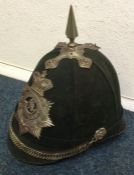 A Somerset Rifles helmet. Est. £10 - £20.
