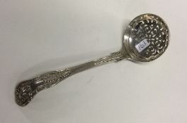 A heavy Kings' pattern silver sifter spoon. London
