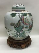 A large Chinese ginger jar on stand. Est. £60 - £8