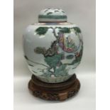 A large Chinese ginger jar on stand. Est. £60 - £8