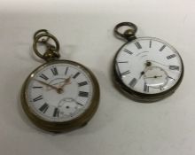 A silver pocket watch together with one other. Est