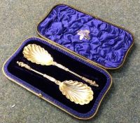 A heavy pair of cast silver preserve spoons. Londo