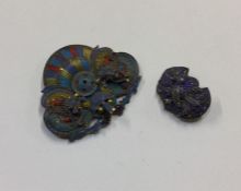 Two Chinese silver and enamelled brooches. Approx.