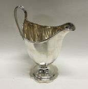 A large 18th Century George III silver cream jug.