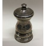 A heavy silver pepper grinder. London 1908. Approx