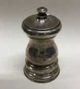 A heavy silver pepper grinder. London 1908. Approx