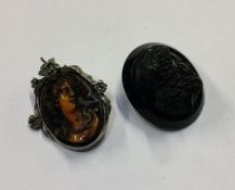 A silver mounted cameo together with one other. Ap