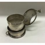 A novelty Victorian silver collapsible beaker. Lon