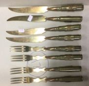 A set of four (plus four) trench art knives and fo