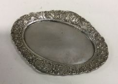 An oval 800 standard silver letter tray decorated