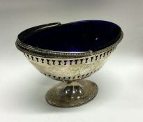 A good Georgian silver swing handled basket with p