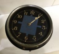 An unusual black faced clock of stylised form. Est