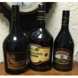 Three various bottles of Irish cream liqueur compr