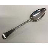 A large silver tablespoon with crested terminal. L