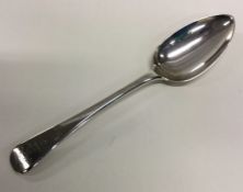 A large silver tablespoon with crested terminal. L