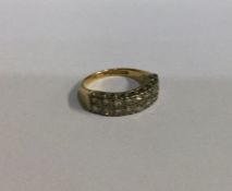 An 18 carat gold diamond mounted two row ring. App